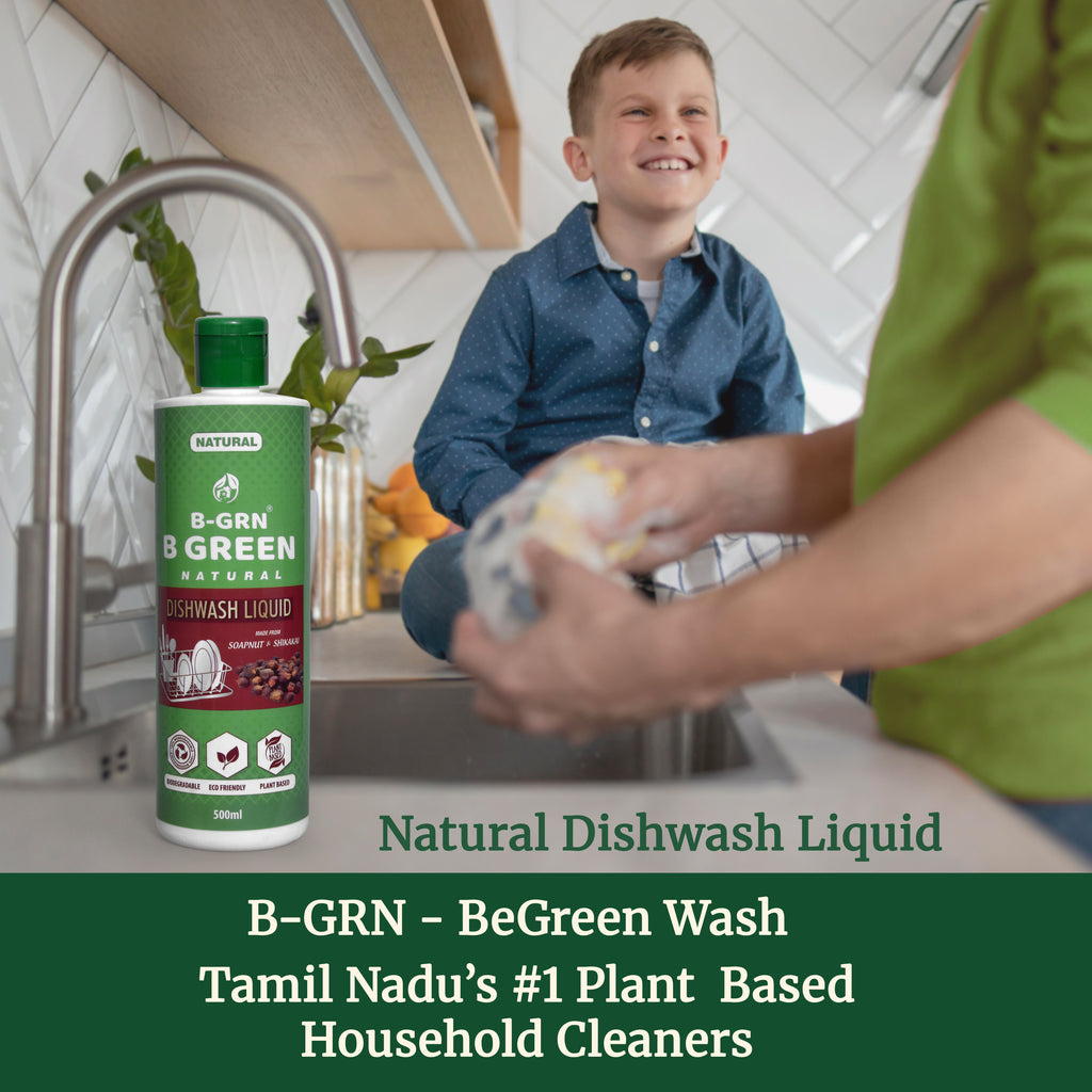 B-GRN BeGreen Wash natural dishwashing liquid being used at kitchen sink — plant-based, safe for family utensils